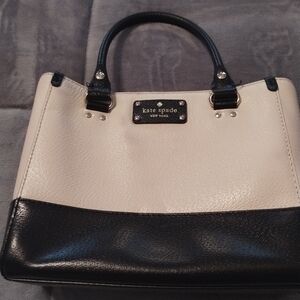 Kate Spade black and white bag with red interior